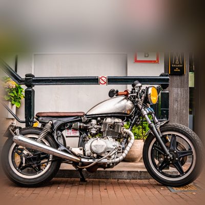 Original photo of a vintage motorcycle before conversion